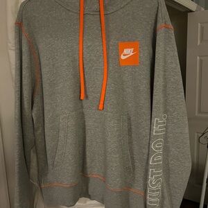 Nike Men's Gray Hoodie with Bold Orange Details